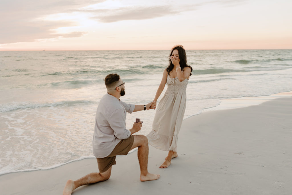 A surprise proposal during a session by extended family photographer Michelle Medina.